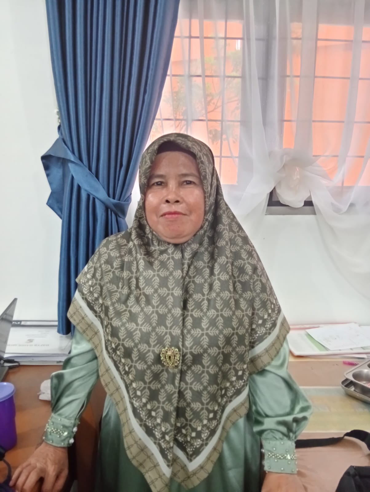 Evi Suriyani, S.Pdi